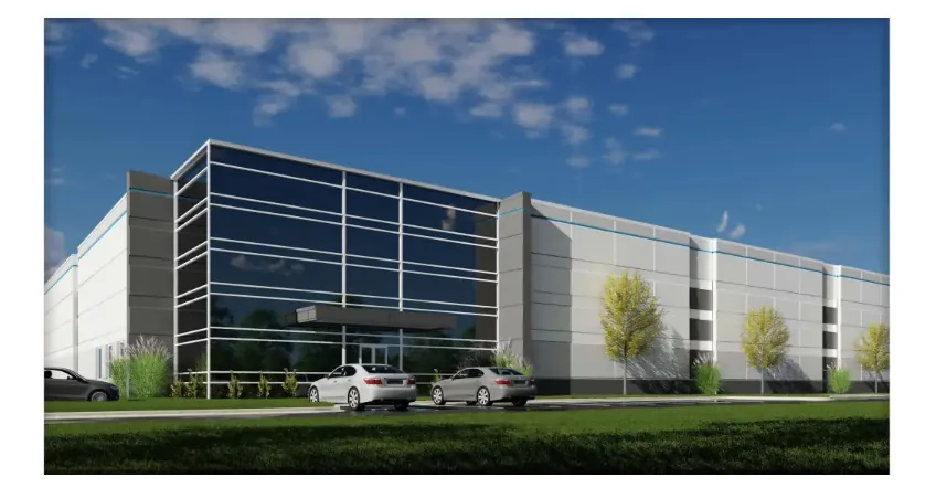 Modern glass-fronted commercial building with cars parked outside, on land that was once the Mason farm